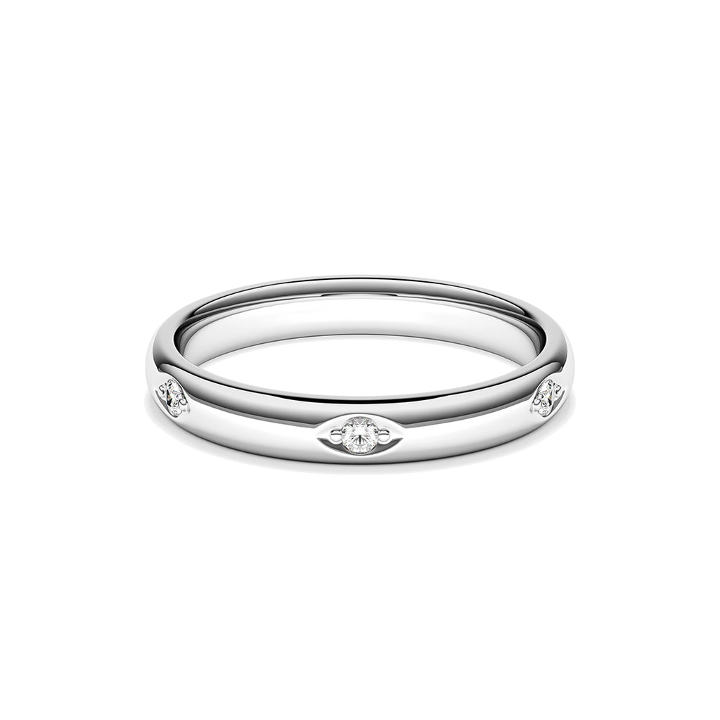 Platinum band ring with six grain-set round brilliant cut diamonds 