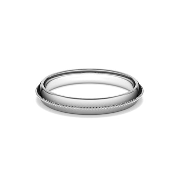 Ring with mill-grained detailing on a pitched platinum band